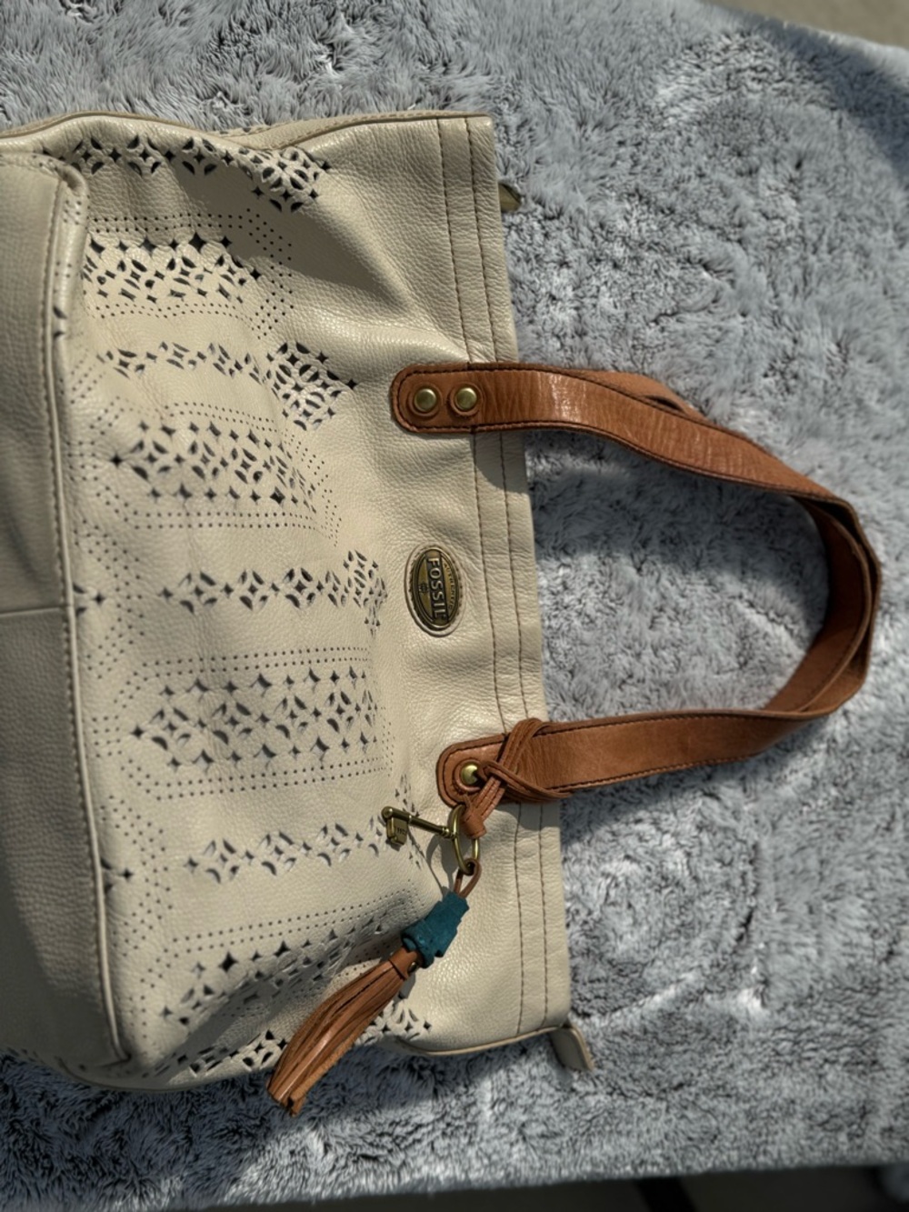 Fossil Cream Perforated Tote with Tan Handles and Tassel